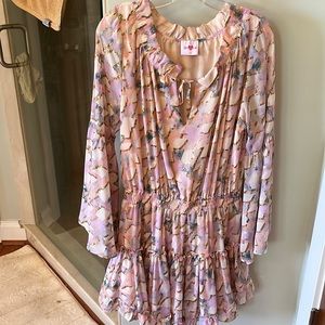 Pink and gold mini dress with bell sleeves and ruffled skirt